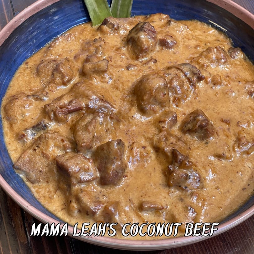 Mama Leah's Coconut Beef, a rich stew with tender beef chunks in a creamy, spiced coconut sauce.