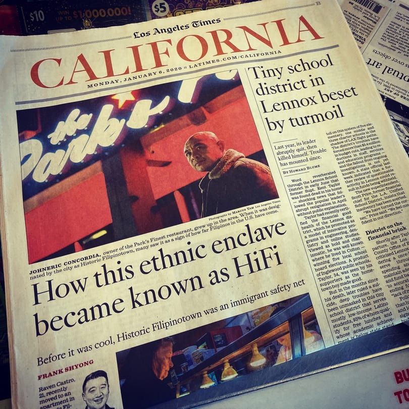 A Los Angeles Times newspaper features an article about The Park's Finest owner, Johneric Concordia.