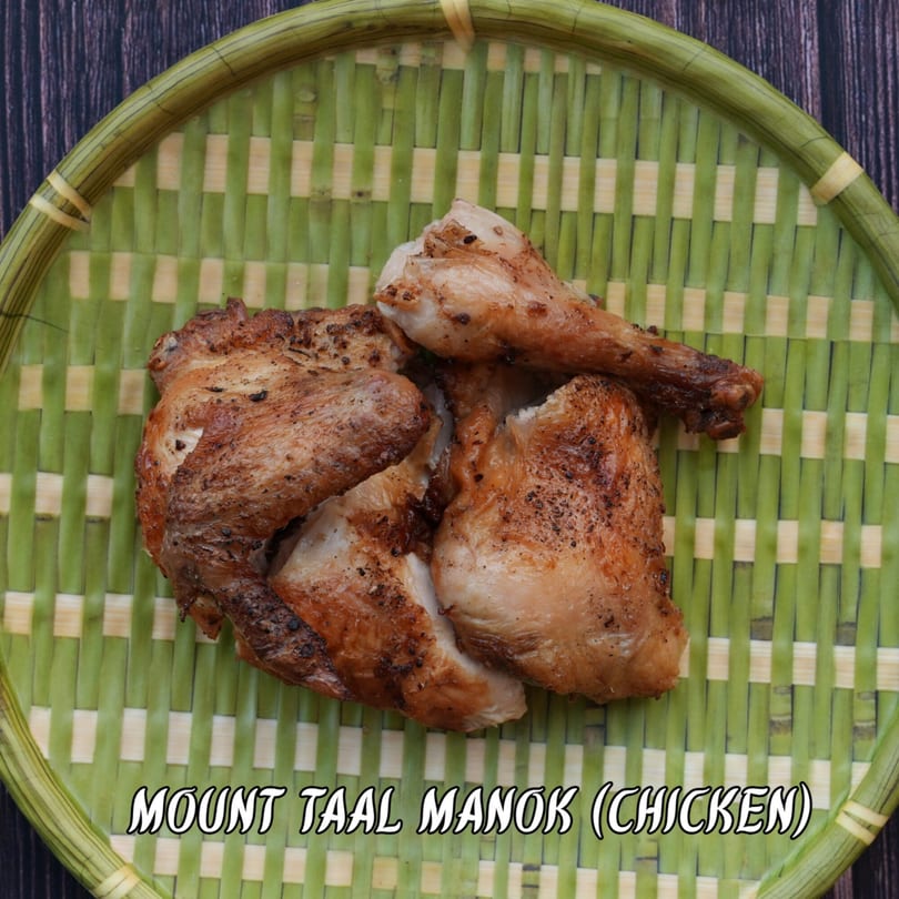 Mount Taal Manok (Chicken) served on a round, green and tan woven bamboo tray.